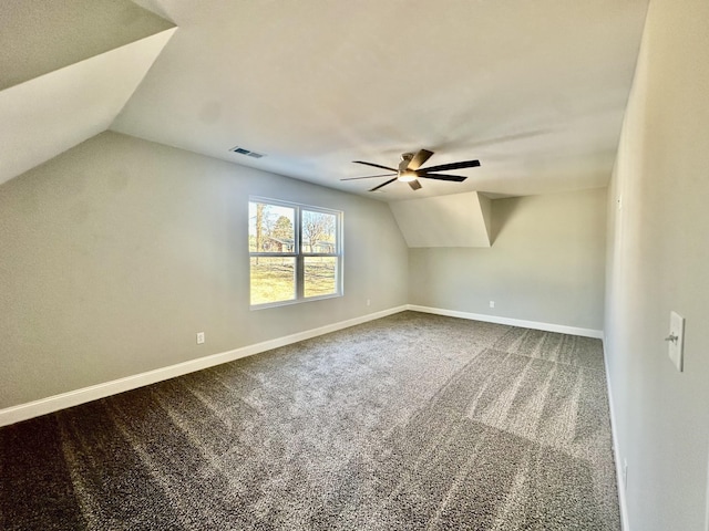 additional living space featuring carpet flooring, ceiling fan, and lofted ceiling