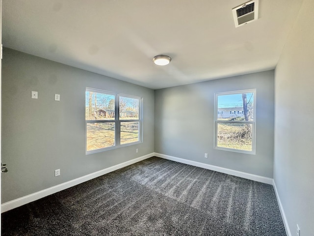 view of carpeted spare room