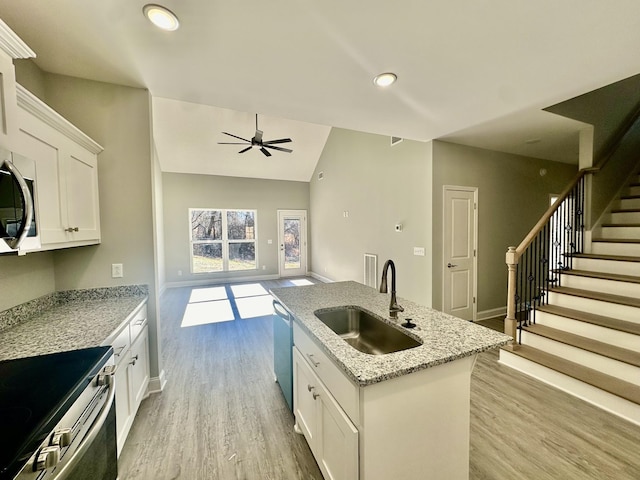 kitchen with white cabinetry, sink, ceiling fan, and appliances with stainless steel finishes