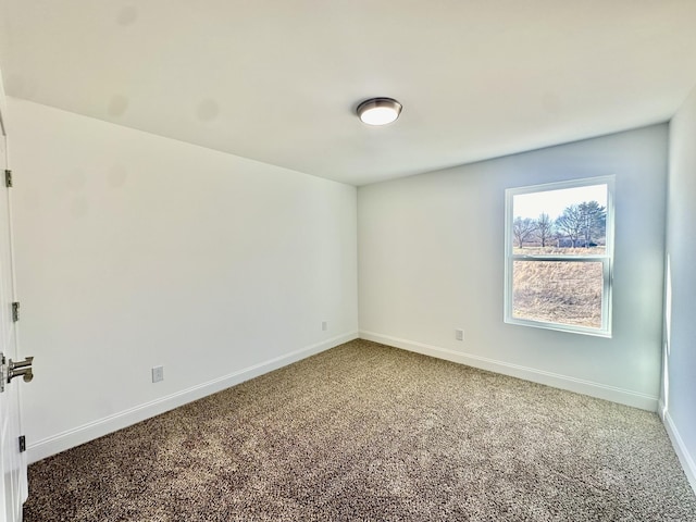 empty room featuring carpet flooring