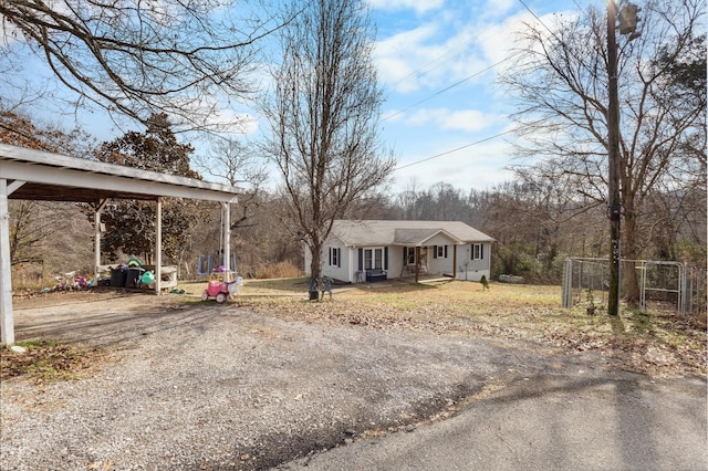 ranch-style house with a carport