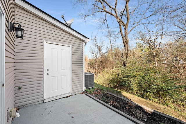 view of outdoor structure featuring central air condition unit