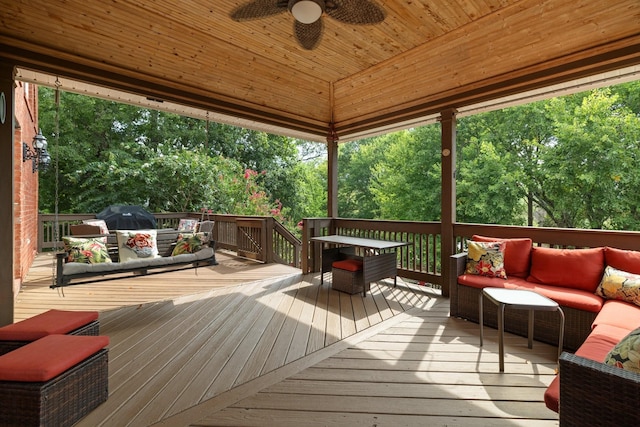 deck featuring ceiling fan, an outdoor hangout area, and grilling area