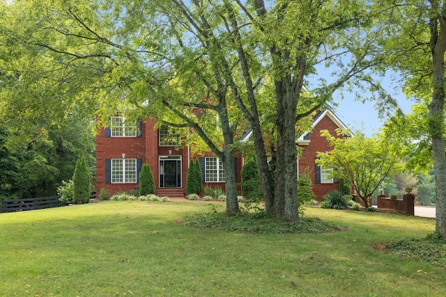 view of front of property with a front lawn