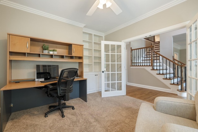 office featuring ceiling fan, ornamental molding, light carpet, and french doors