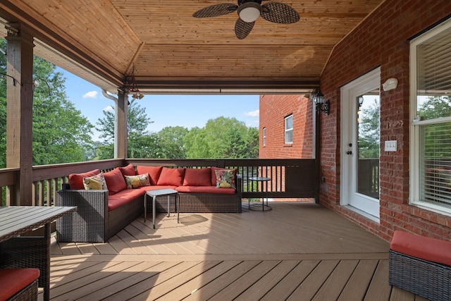 deck featuring a gazebo, an outdoor living space, and ceiling fan