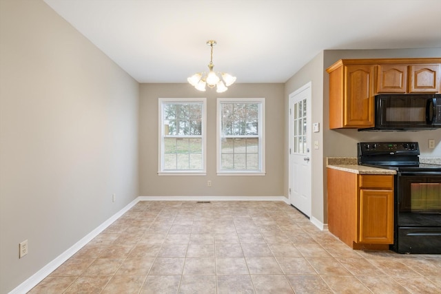 kitchen featuring light tile patterned floors, pendant lighting, a notable chandelier, and black appliances