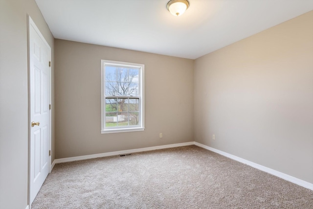 view of carpeted spare room