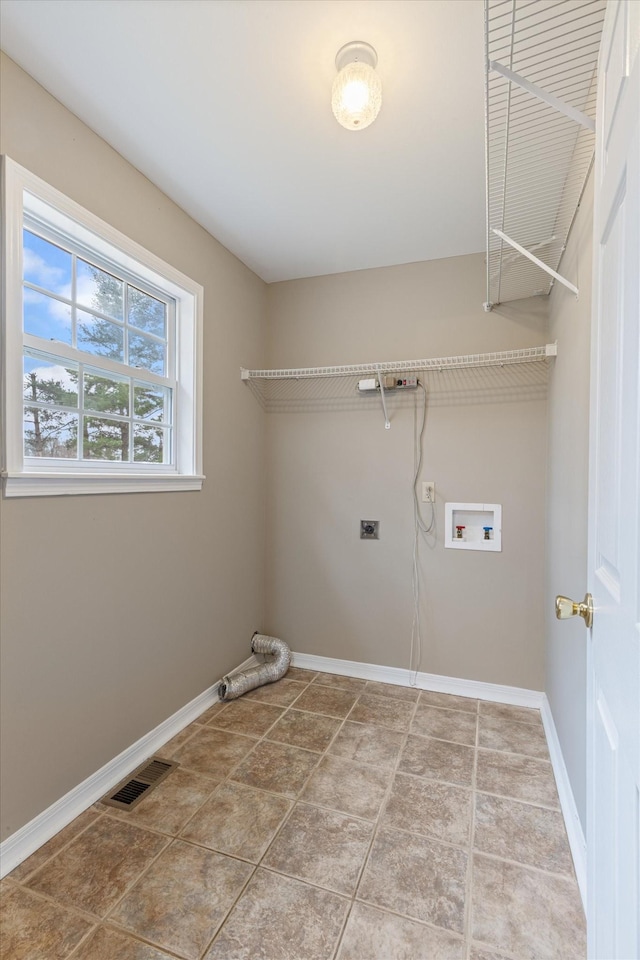 laundry room featuring hookup for an electric dryer, hookup for a gas dryer, and washer hookup