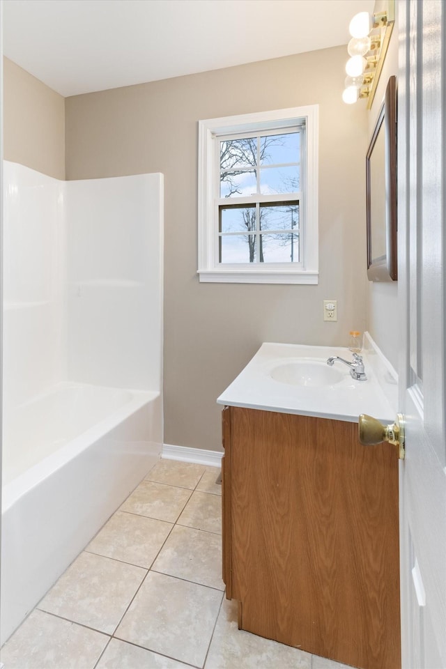 bathroom with tile patterned floors, vanity, and tub / shower combination