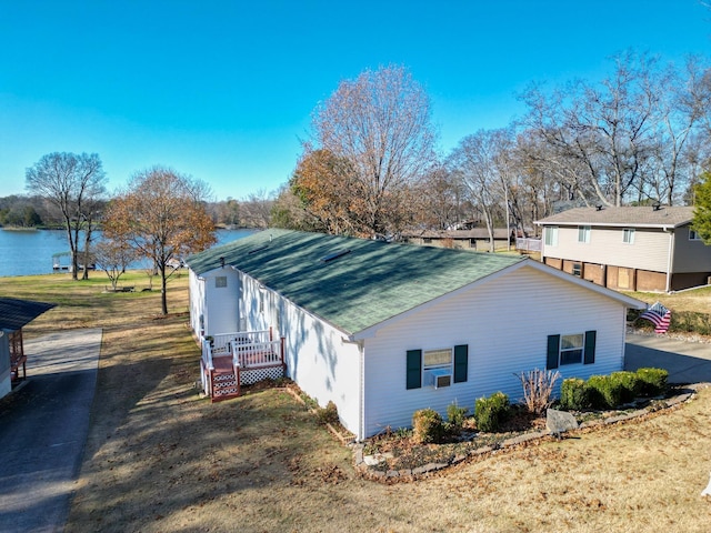 view of side of property with a water view