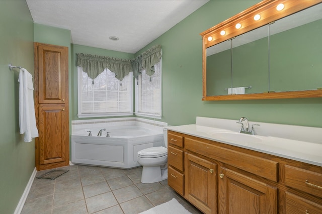 bathroom with a bathing tub, tile patterned flooring, toilet, and vanity