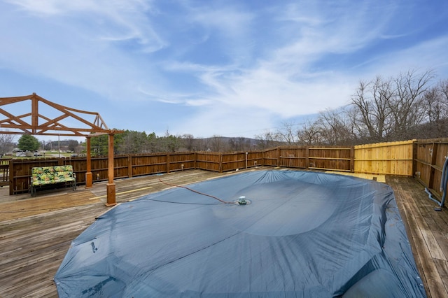 deck with a covered pool