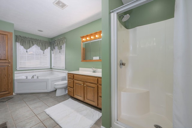 full bathroom with tile patterned flooring, vanity, toilet, and plus walk in shower