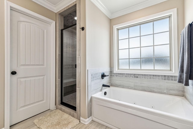 bathroom featuring wood-type flooring, separate shower and tub, and crown molding