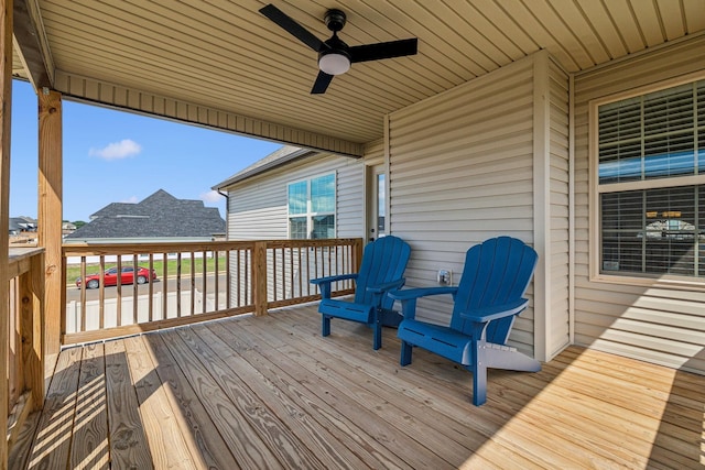 wooden deck with ceiling fan