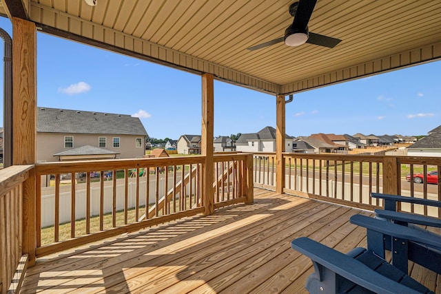 wooden deck with ceiling fan