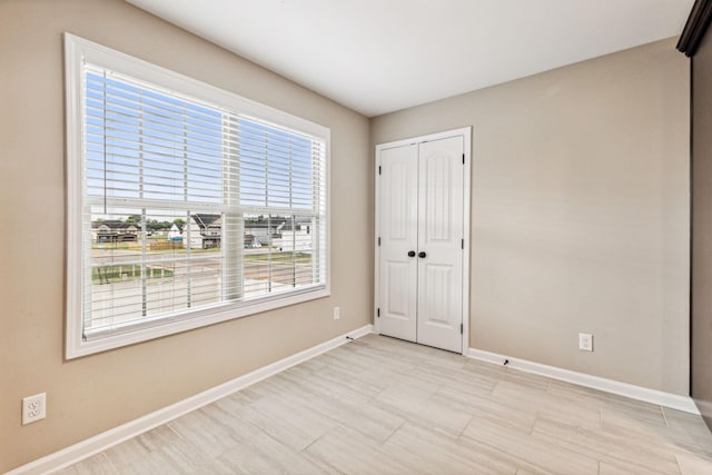 unfurnished bedroom featuring a closet