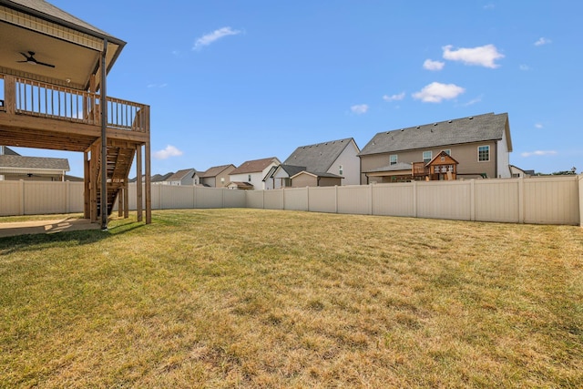 view of yard with a wooden deck