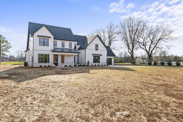 view of front of property featuring a porch and central AC unit