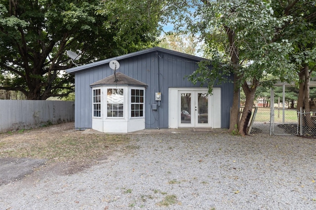 view of outbuilding with french doors