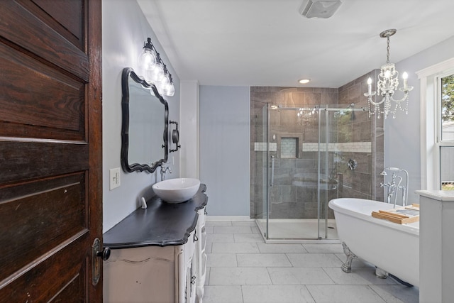 bathroom with vanity, shower with separate bathtub, and an inviting chandelier