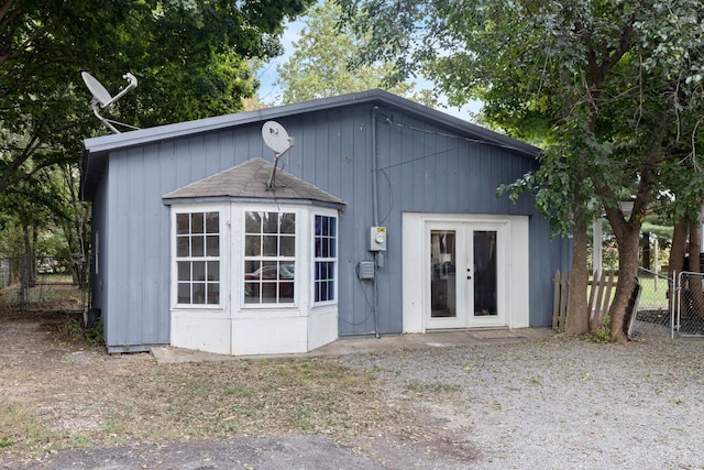 back of property featuring french doors