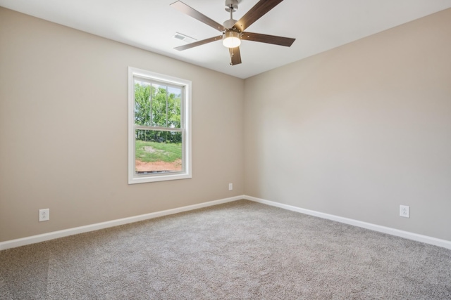 empty room with carpet and ceiling fan