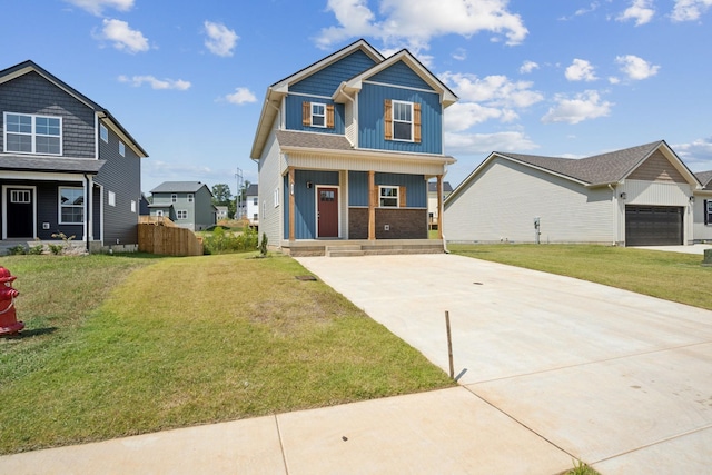 craftsman-style home with a front lawn and covered porch