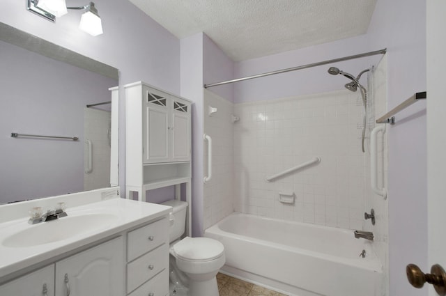 full bathroom featuring vanity, toilet, washtub / shower combination, and a textured ceiling