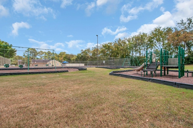 view of jungle gym with a lawn