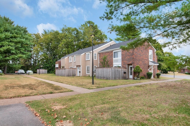 view of property exterior featuring a yard