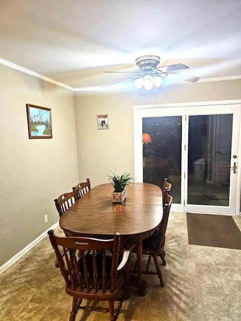 dining room featuring ceiling fan and ornamental molding