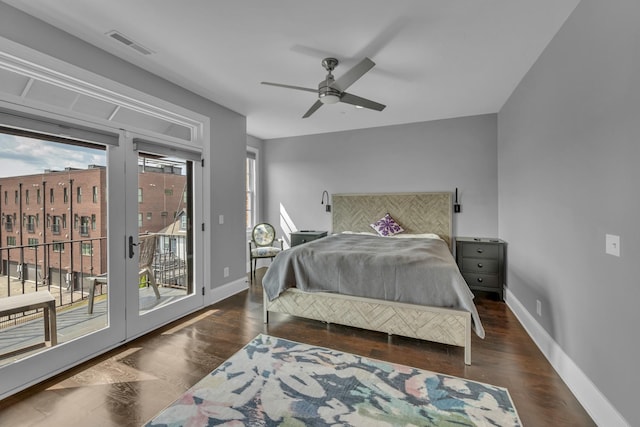 bedroom with access to exterior, ceiling fan, and dark hardwood / wood-style floors