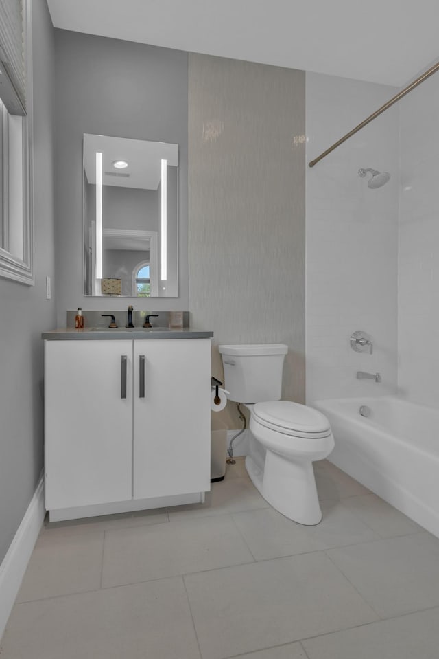 full bathroom with tile patterned flooring, vanity, toilet, and washtub / shower combination