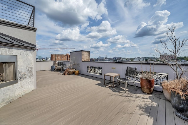 wooden deck featuring a water view