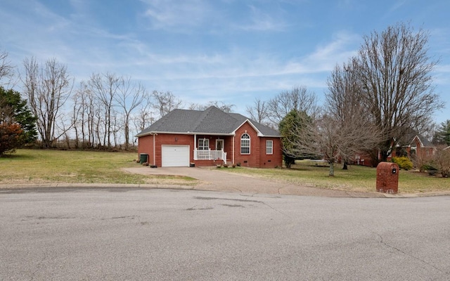 single story home with a garage and a front lawn