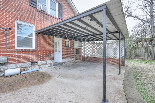 view of patio featuring a carport