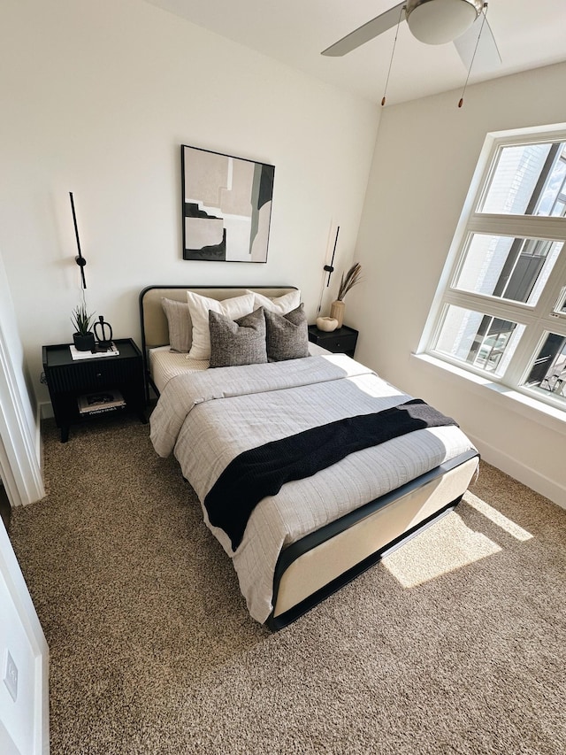 bedroom featuring carpet flooring and ceiling fan