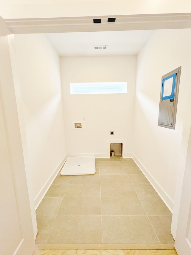 laundry area featuring tile patterned floors, electric dryer hookup, and hookup for a washing machine