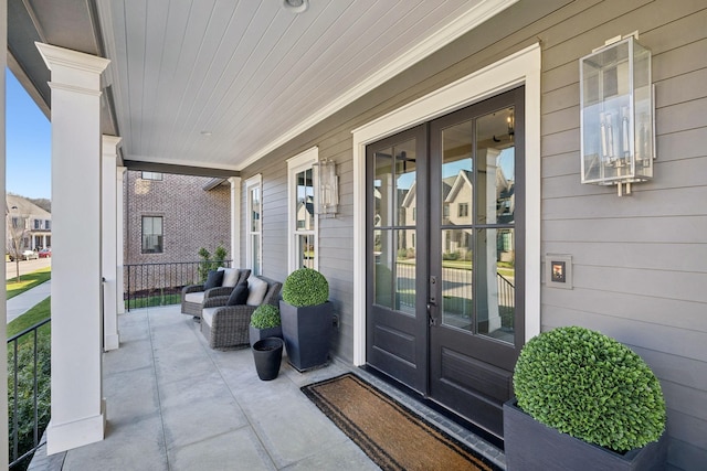 doorway to property with a porch