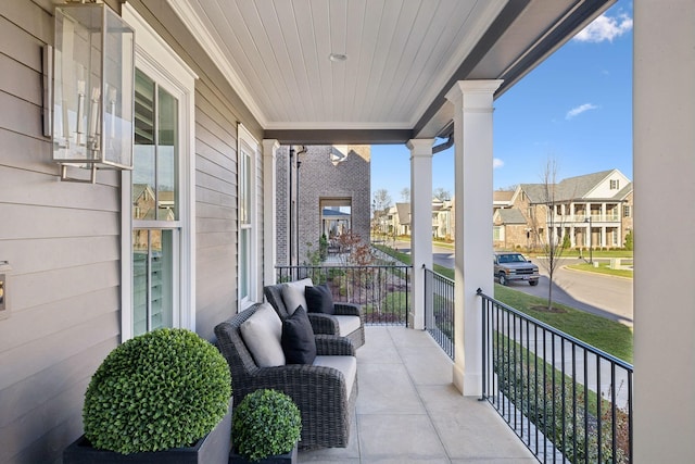 balcony featuring a porch