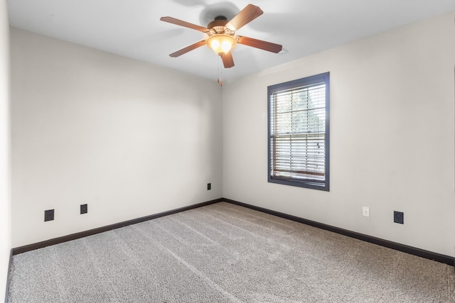 carpeted empty room with ceiling fan