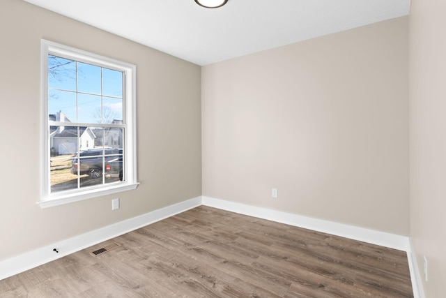 empty room featuring light hardwood / wood-style flooring