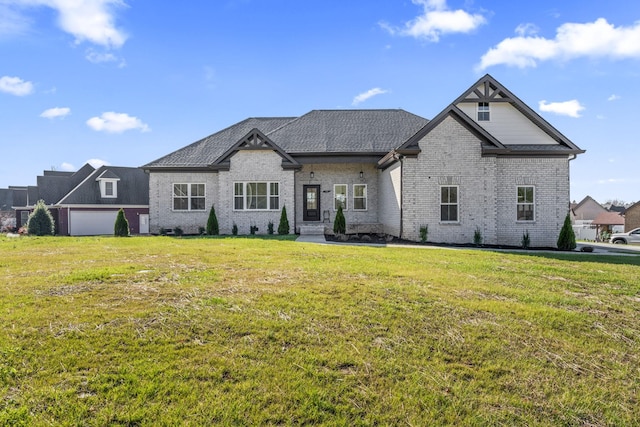 view of front of home with a front lawn