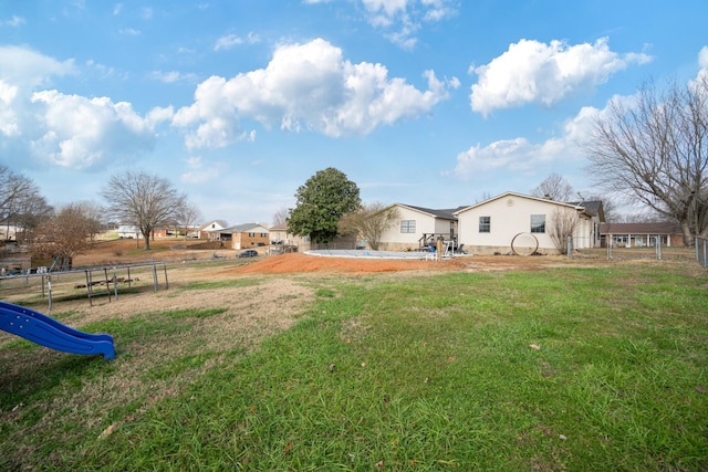 view of yard with a playground