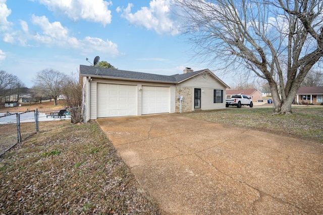 view of property exterior featuring a garage