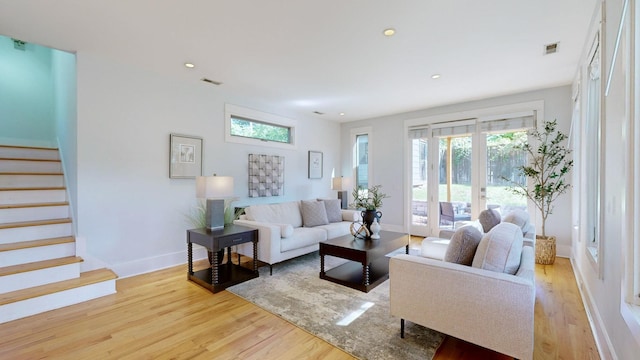 living room with light hardwood / wood-style floors