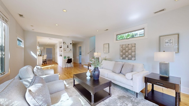 living room with light hardwood / wood-style floors