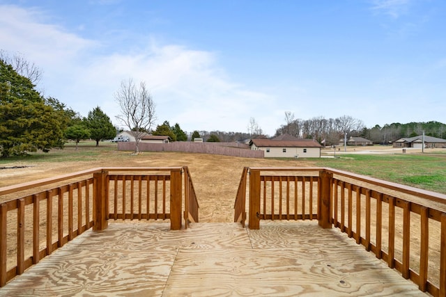 wooden deck with a yard